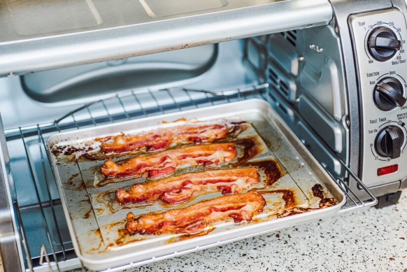 Bacon slices on an oven-proof sheet